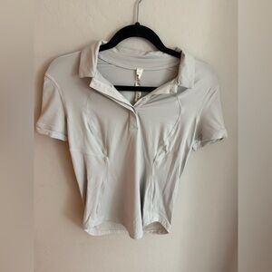 lululemon Quick-Dry Short Sleeve Polo Shirt. Size 4.